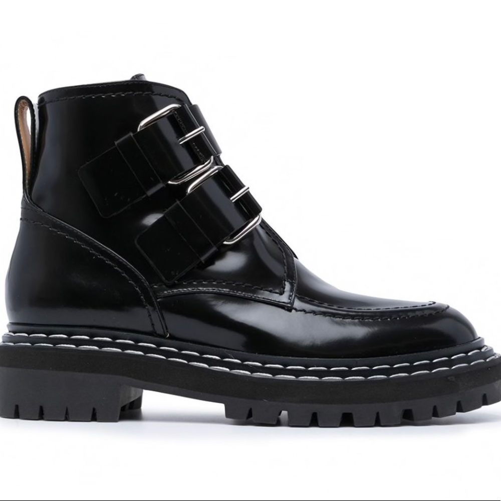 New black leather proenza boots